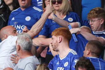 Leicester fans fight in stands as they turn on each other after relegation